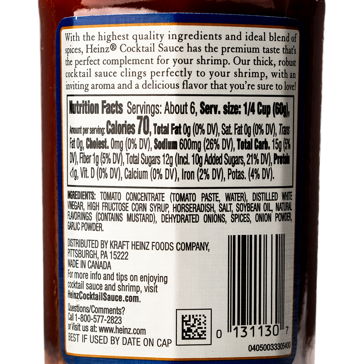 Heinz Seafood Cocktail Sauce bottle with label, ready for dipping seafood or shrimp on a grocery store shelf.