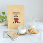 Pure Grain 100% ground roasted black sesame in a 500g package, ideal for cooking and baking.
