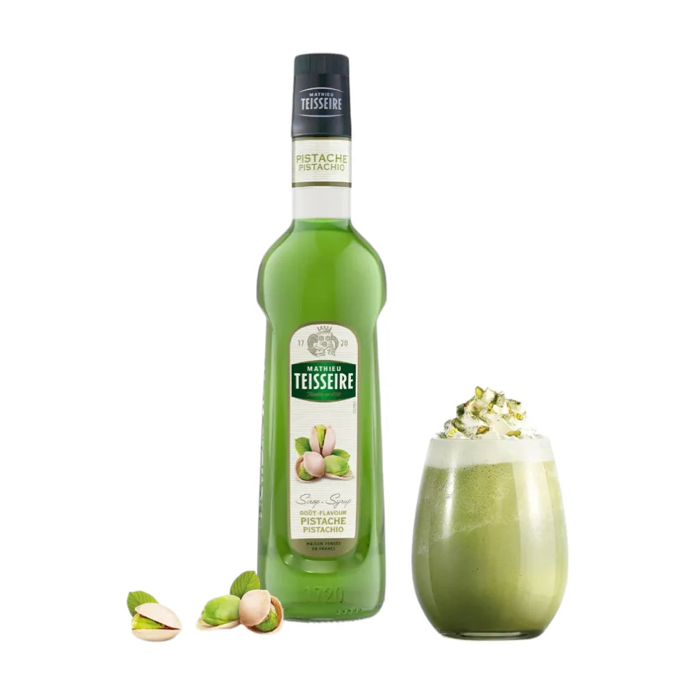 Mathieu Teisseire Pistachio Syrup 700ml bottle, ideal for flavoring beverages and desserts in dry grocery storage.