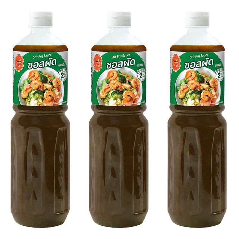 J-LEK stir-fry sauce bottles, 550g, in clear plastic packaging, ideal for enhancing Asian-inspired dishes in dry grocery section