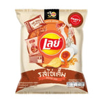 LAYS Classic Salted Egg snacks in 100g packs, showing crispy textured snack with salted egg flavor in a colorful bag.