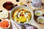 Rabbit Brand yellow Chinese noodles, 1kg pack of dry grocery, uncooked and fresh-looking noodles on a plain background.
