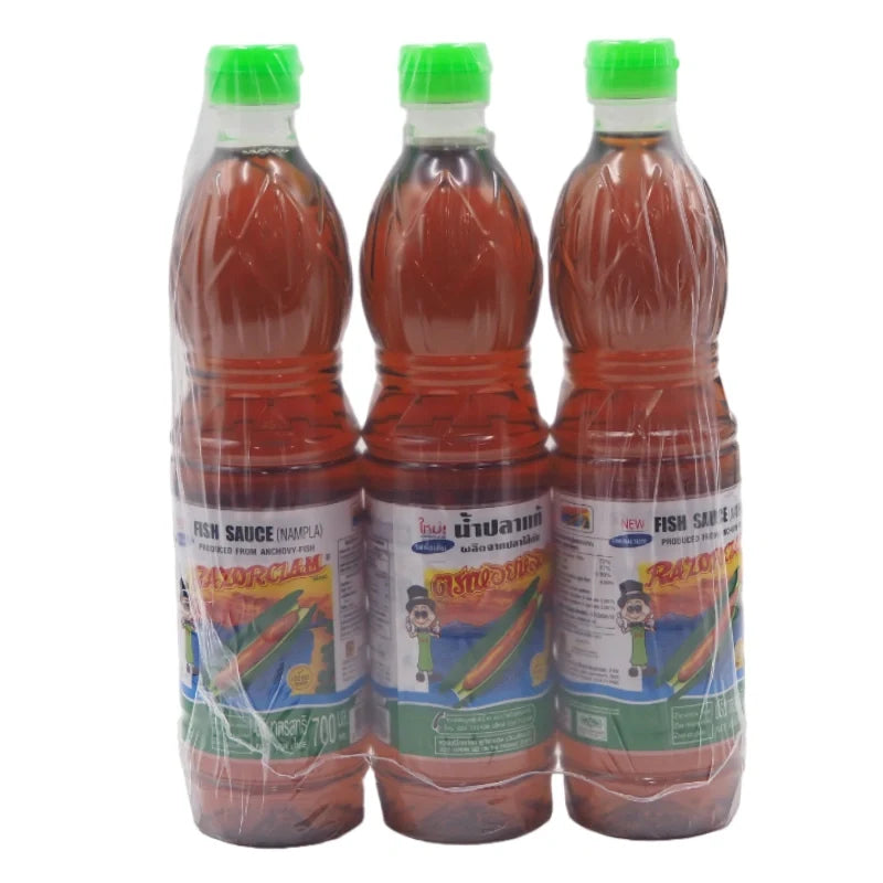 Three 700ml bottles of Razorclam Fish Sauce in clear glass bottles, labeled as dry grocery from Razorclam.