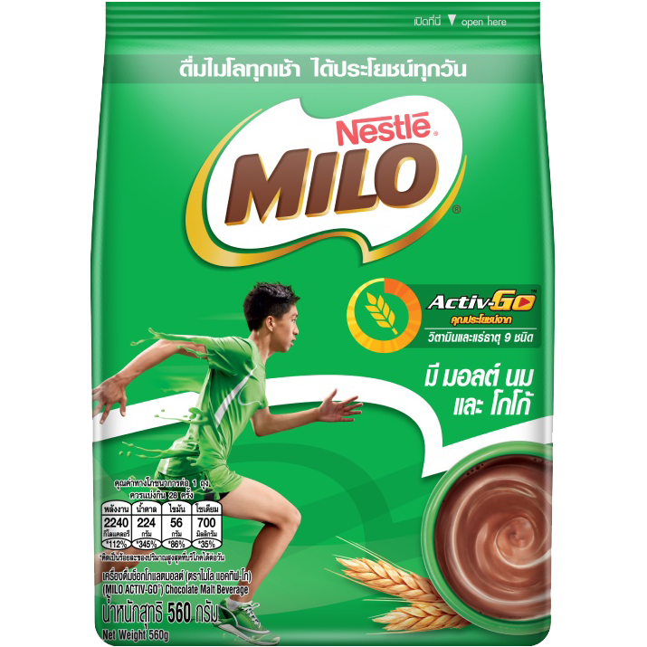 Nestle Milo Activ-Go chocolate malt powder drink in a glass, showcasing the rich, frothy beverage with chocolate and malt flavors.
