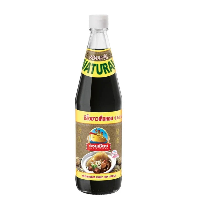 Bottle of Nguan Chiang Mushroom Light Soy Sauce, 700ml, in a clear plastic bottle with a label, used for cooking and seasoning.