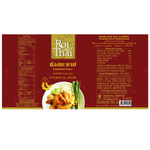 Bottle of Roi Thai Tamarind Sauce for cooking and Asian recipes, with a dark, thick liquid inside a clear glass bottle.