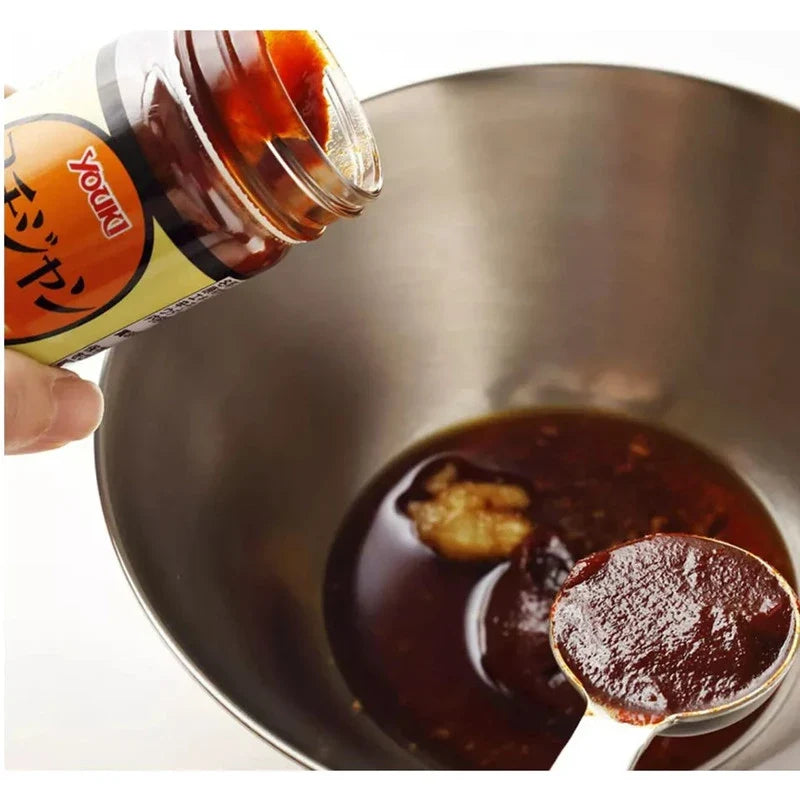 Youki Gochujang Sweet and Spicy Miso Sauce, Korean style, in a jar, with vibrant red color and label showing Korean ingredients.
