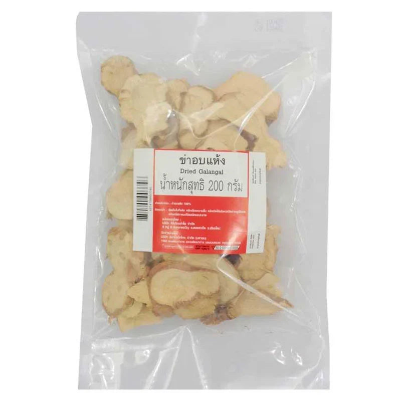 Dried galangal slices in a clear container, packaged by MAKRO, for use in Asian cooking and dry grocery recipes.