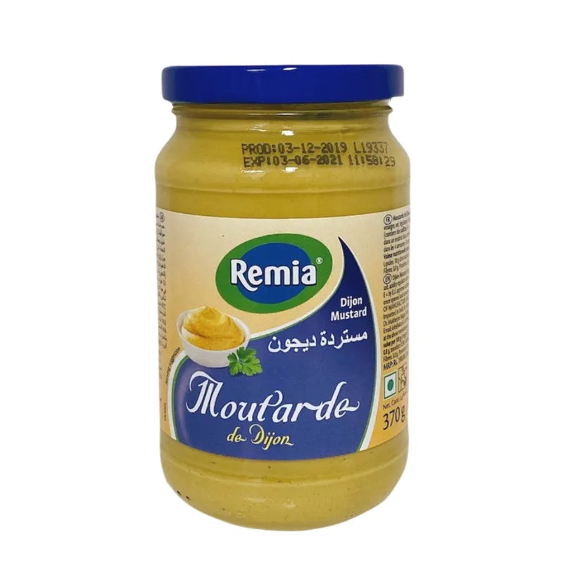 Jar of REMIA Mustard in 370g size, showing the bright yellow condiment with a label on the dry grocery shelf.