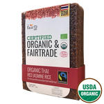 Fair D Organic Fairtrade Red Rice in a grocery package, showing the colorful rice grains on a white background.