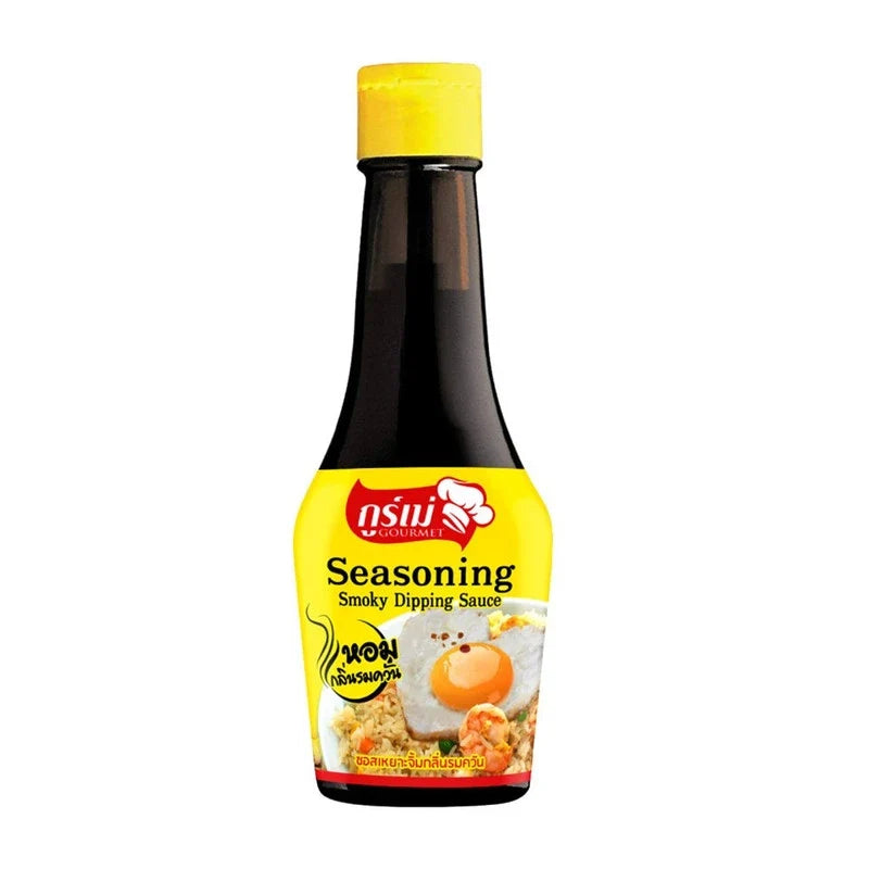 Nguan Chiang Gourmet Smoky Dipping Sauce in 200ml bottle, ideal for adding rich flavor to dishes.