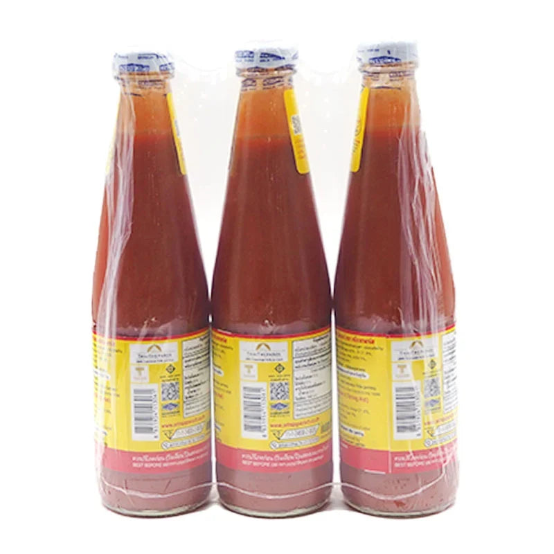 Sriraja Panich Chili Sauce 570g, three bottles, Thai dry grocery product with red chili sauce in clear bottles