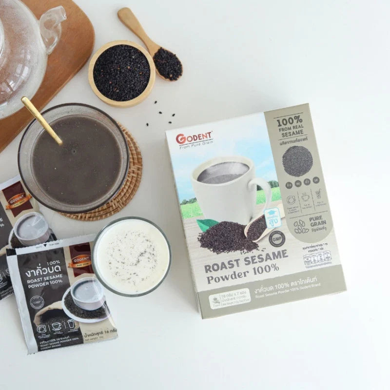 Godent Golden 100% ground roasted black sesame in a 112g box, dry grocery product showing the sesame powder inside the package.