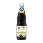 Deksomboon Mushroom Soy Sauce Less Sodium in 700ml bottle, dry grocery item with dark soy sauce and mushroom flavor