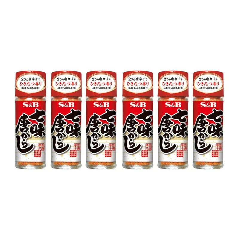S & B Shichimi Togarashi assorted chili pepper powder bottles in clear glass jars, showcasing vibrant red spice blends.