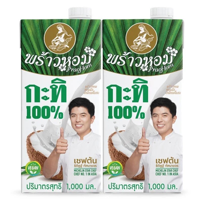 PRAOHOM Coconut Milk 1L bottles, dry grocery product, showing the white coconut milk inside clear bottles.