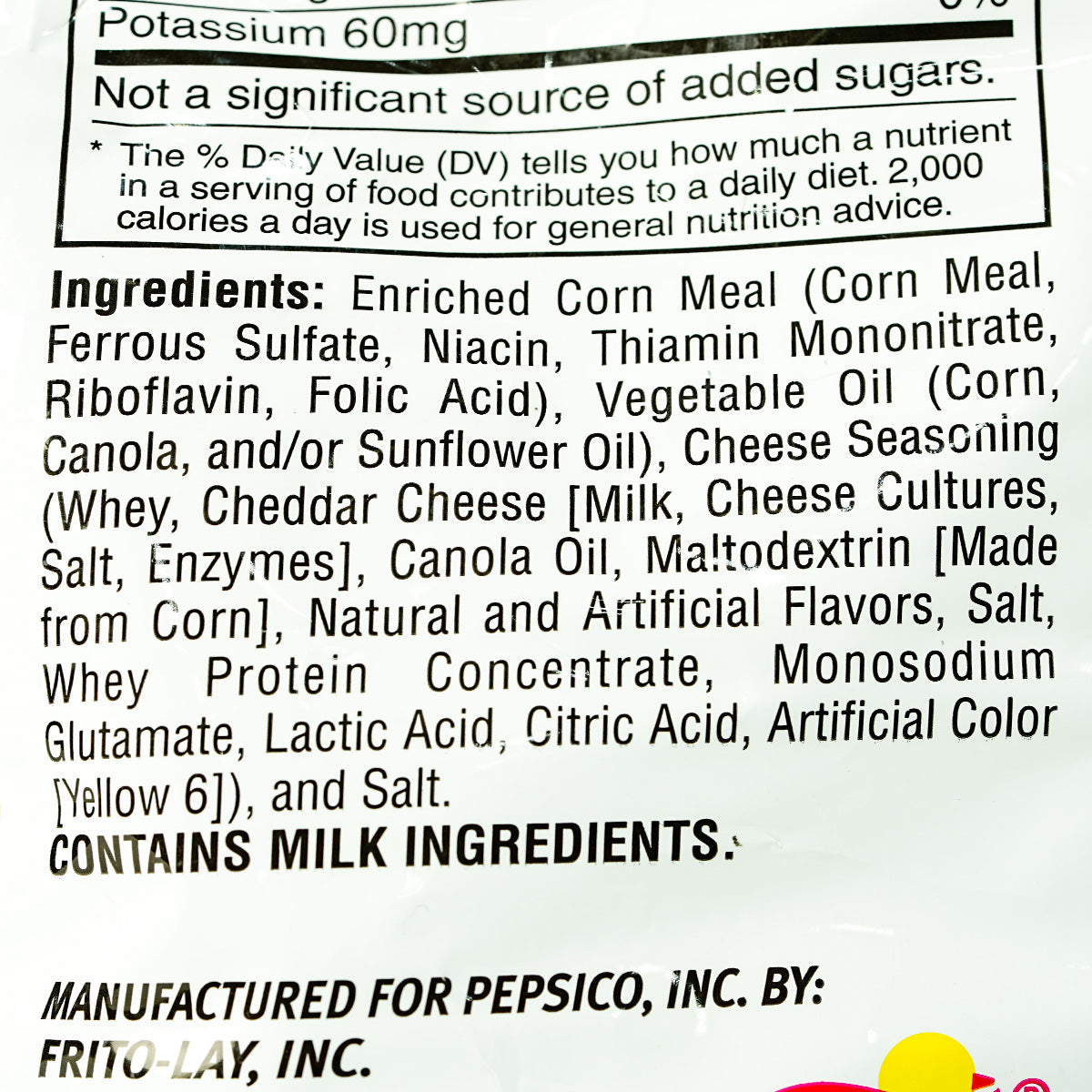 Cheetos Puffs confectionery snacks in bright orange cheese-flavored puffed corn snacks, shown in a close-up image.