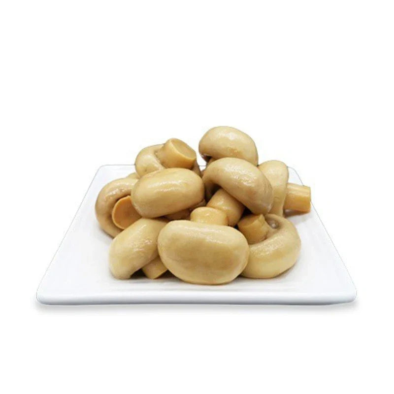 Whole Mica Champignon mushrooms in brine, 400g jar, showcasing fresh, whole mushrooms in clear brine liquid.