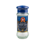 Nguan Soon Iodized Table Salt in a clear plastic container, showing fine white salt grains for cooking and seasoning.