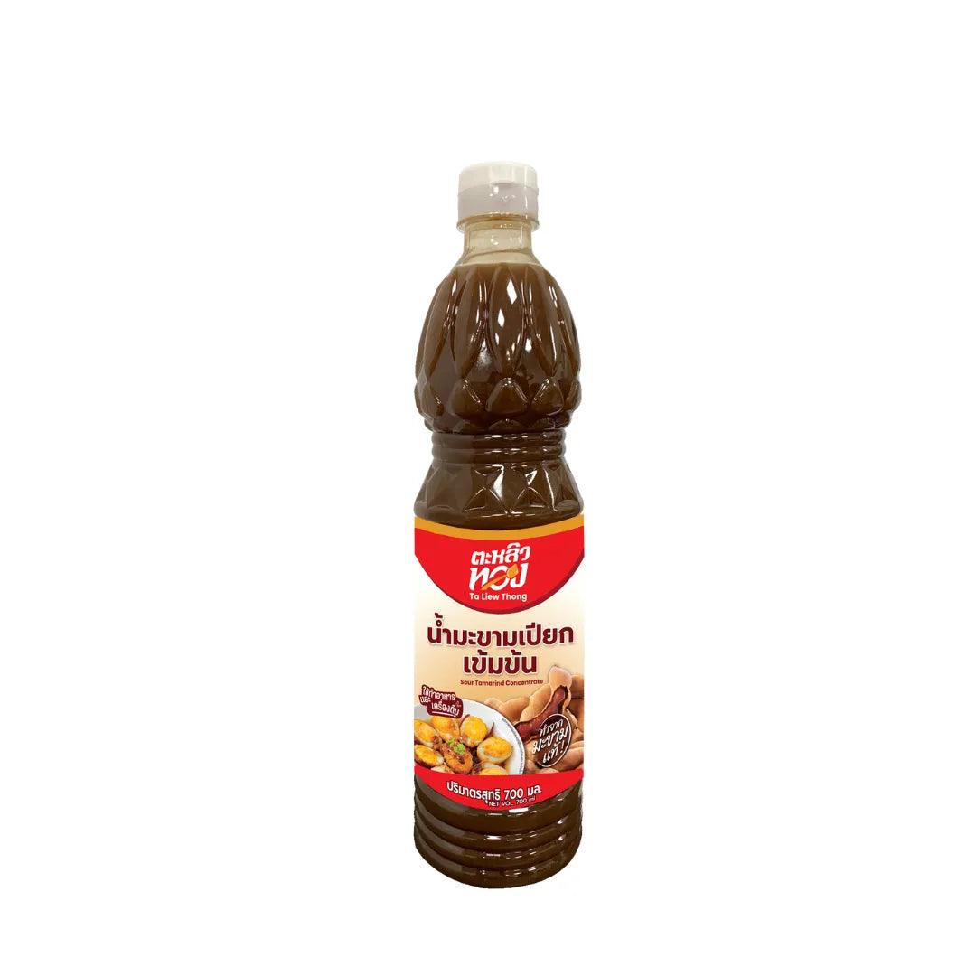 Taliothong Sour Tamarind Paste Concentrate 700ml in a clear jar, showing dark brown tamarind paste for cooking and flavoring.