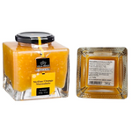 Jar of Campo Sicilian Oranges Jam with fresh orange slices on the label, showcasing vibrant orange fruit and clear branding.