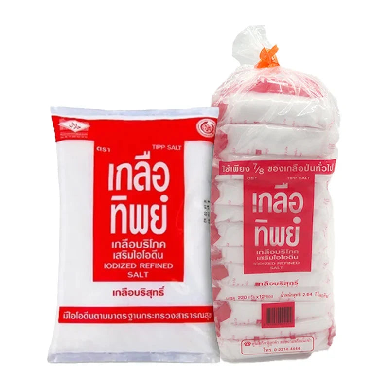 Thip Salt Iodized Refined dry grocery product, 220g x 12 packs, showing salt granules in a clear container.