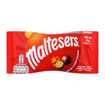 Maltesers chocolate snacks in a bowl, showing the round malted milk balls from Maltesers brand on a white background.