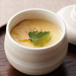 Youki Granule Fish Dashi Soup Stock with Roasted Chin Flying, dry grocery product, close-up of granules in a bowl.