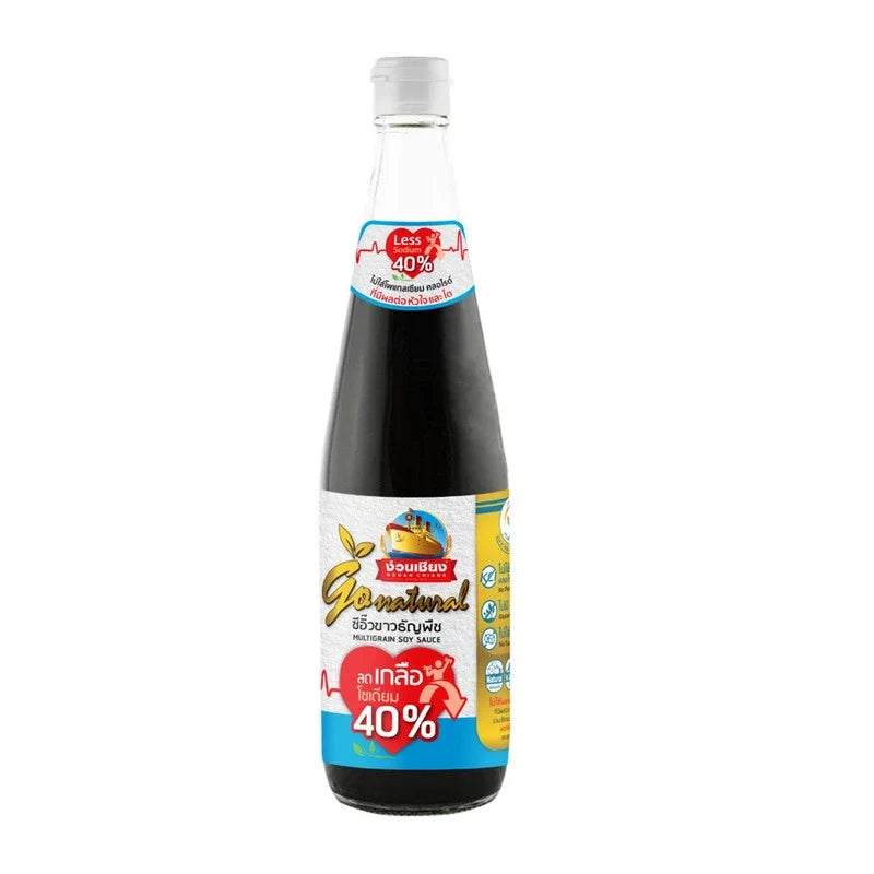 Nguan Chiang Less Sodium Multigrain Soy Sauce 40% in 500ml bottle, natural light, label with brand and product details.