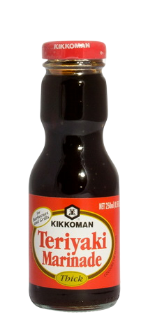 Bottle of Kikkoman Teriyaki Sauce in a grocery setting, showcasing the label and sauce inside the clear bottle.