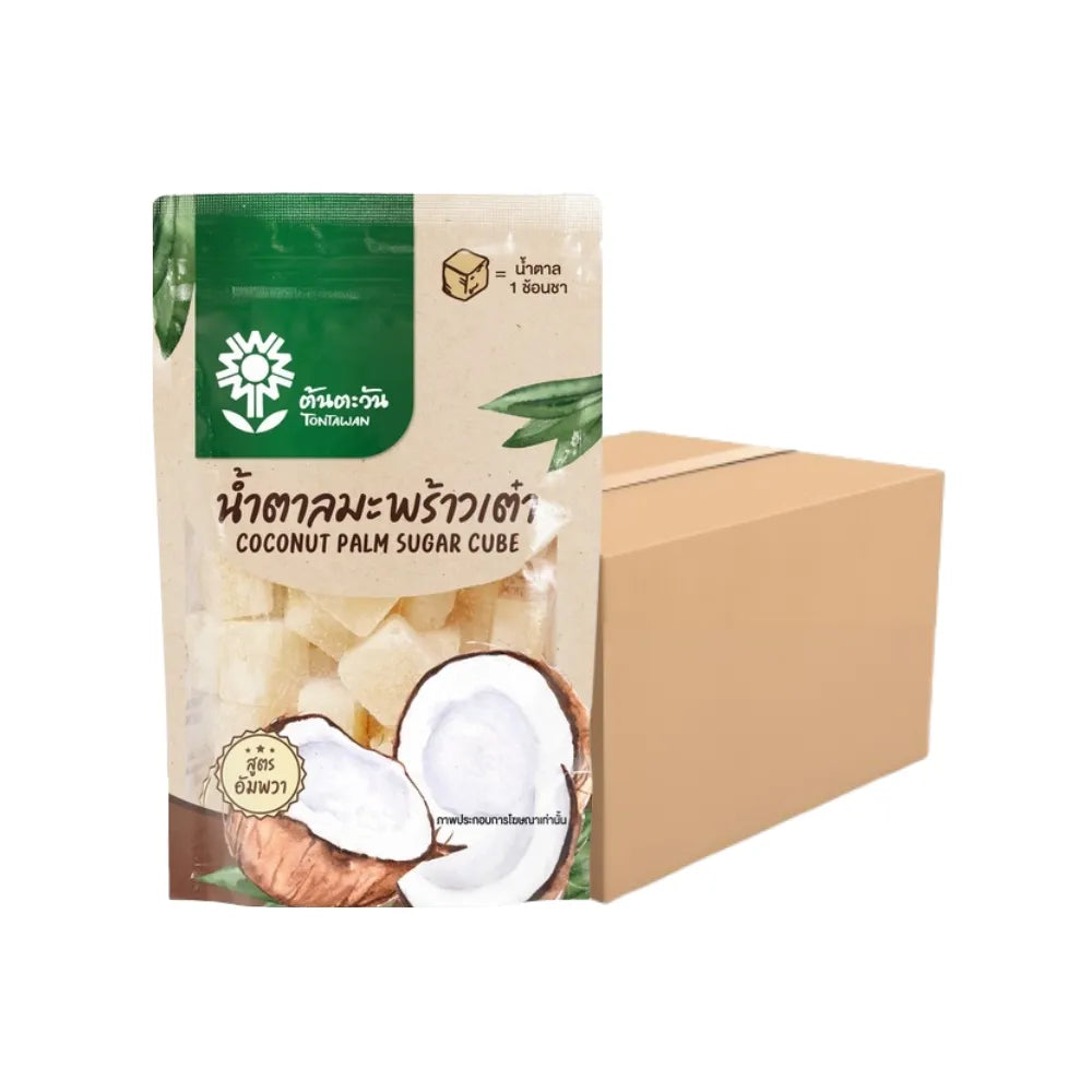 Diced coconut sugar from TONTAWAN in 150g packs, displayed in a clear bowl on a wooden surface.