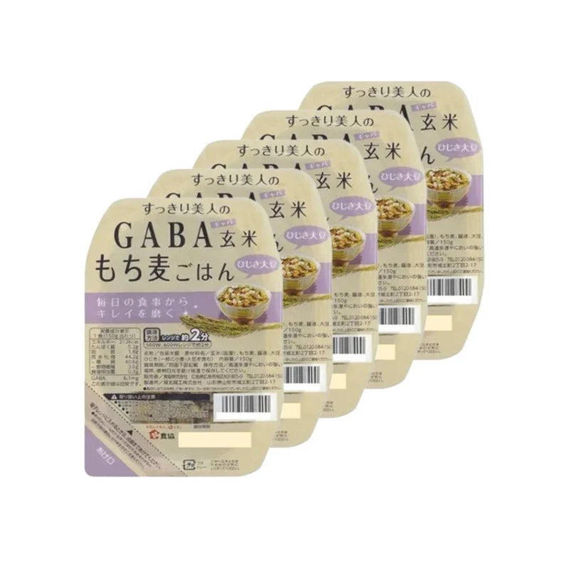 Shokkyo Gaba Genmai Mochimugi Gohan Hijiki Daizu dry grocery mix in a clear bag, showing various grains and dried hijiki seaweed.