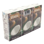 Coconut milk from CHAOKOH in a 500ml carton, displayed alongside two additional cartons, ideal for cooking and baking.