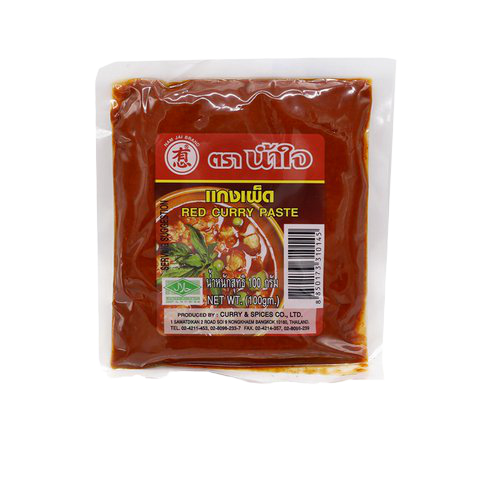 Nam Jai Red Curry Paste in a jar, showcasing vibrant red color, perfect for Thai cooking and flavorful red curry dishes.