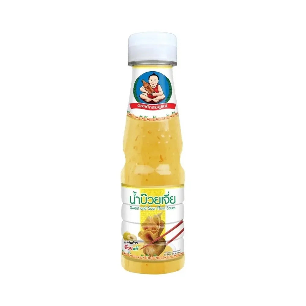 Deksomboon Plum Sauce 175g bottle showing the dark, glossy sauce in a clear glass container for dry grocery use.