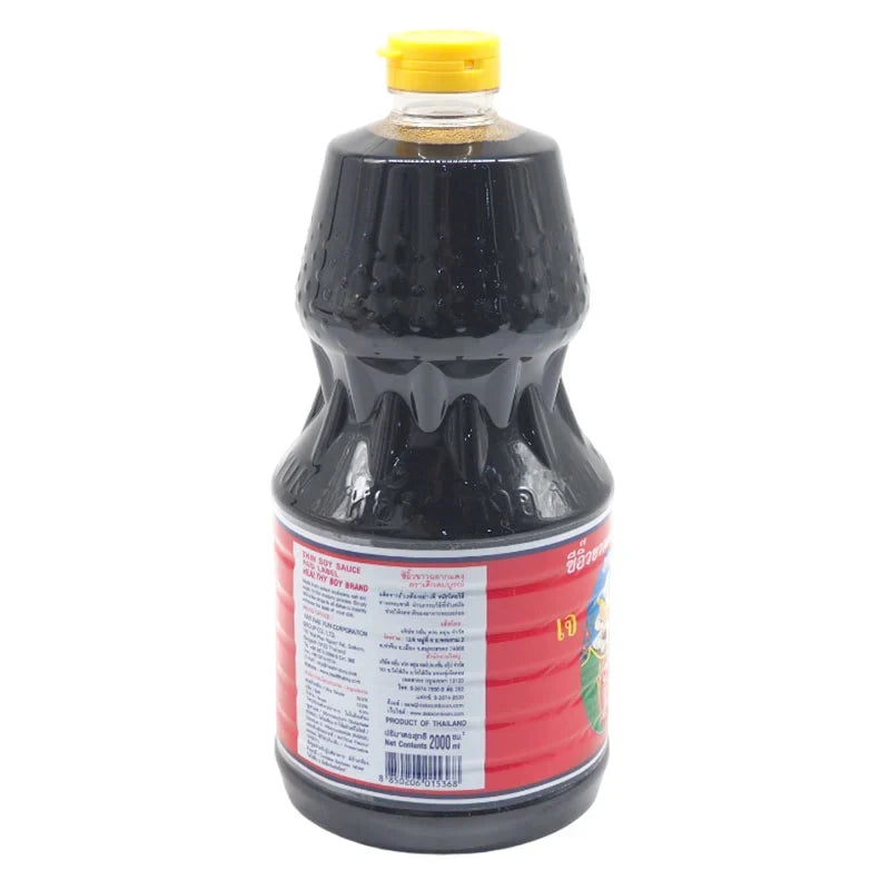 Bottle of DEK SOM Boon Soy Sauce Formula 5, 2L, in a clear plastic container with a label, used for cooking and seasoning.