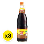Three bottles of Golden Mountain Sauce Brown in 600ml bottles, showing the sauce's dark color and label on the packaging.