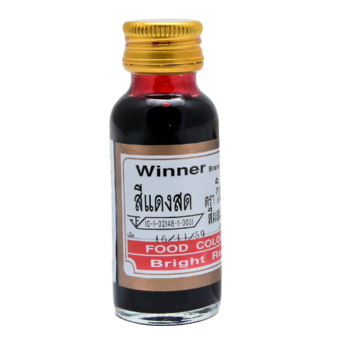 Bright red food coloring from Winner Food Color, used for baking and decorating, with vibrant liquid dye in a clear bottle.
