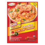 Creamy Tomyum soup from Rosdee, a grocery product with vibrant ingredients in a bowl, ready for serving.
