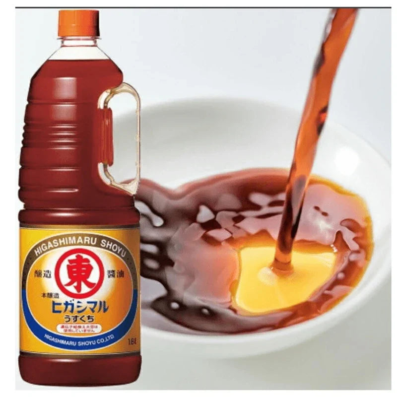 HIGASHIMARU Usukuchi Shoyu soy sauce bottles, 1.8L each, in a dry grocery setting, showing clear label and dark soy liquid