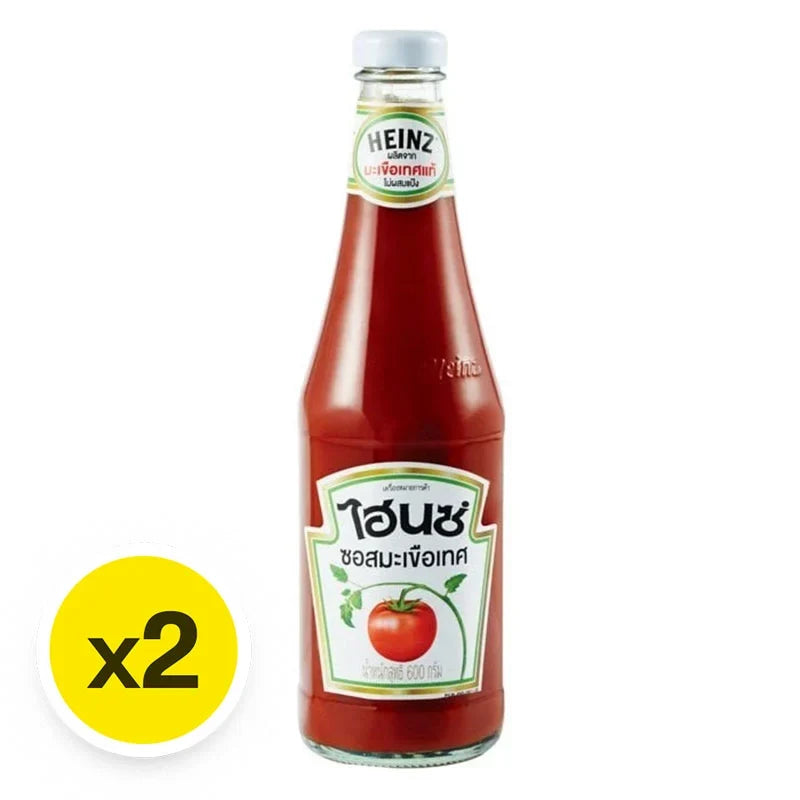 Two 600g bottles of Heinz Tomato Sauce in clear bottles with red caps, ideal for cooking and condiments in dry grocery shopping.