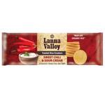 Lanna Valley Organic Rice Crackers with sweet chili and sour cream flavor, showing crispy snack pieces in the image.