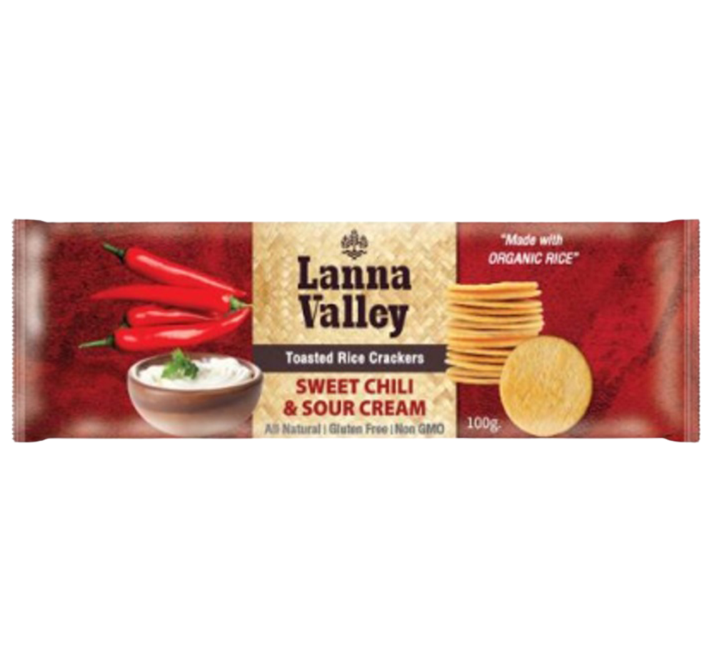 Lanna Valley Organic Rice Crackers with sweet chili and sour cream flavor, showing crispy snack pieces in the image.