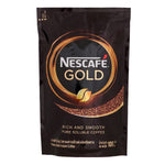 A steaming cup of Nescafe Gold coffee drink in a white mug, showcasing the rich, smooth coffee beverage.