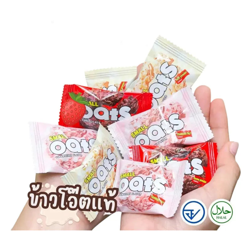 Nezline Oat Rings in Snacks Confectionery with three milk chocolates, 60g package featuring oat ring snack and chocolate pieces.