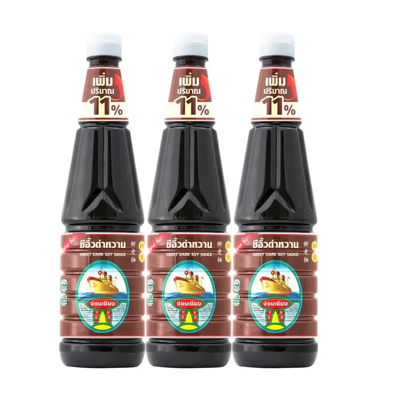 NGUAN CHIANG Sweet Dark Soy Sauce 950g bottles, dark and glossy, arranged in a row for dry grocery use.