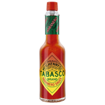 Bottle of Tabasco Habanero Sauce, spicy hot pepper sauce in a clear glass bottle with red cap, labeled with Tabasco branding.