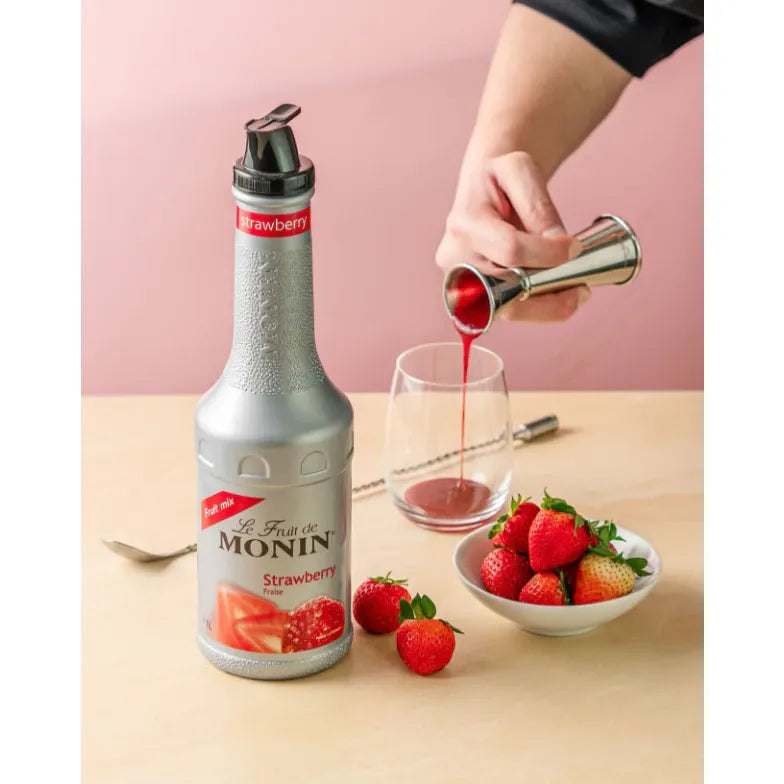 Monin Strawberry Fruitmix in 1000ml bottle, ideal for dry grocery use, featuring fresh strawberry flavor and vibrant red color.