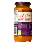 Jar of Patak's Tikka Masala Curry Sauce with label showing the product name and brand in a grocery setting.
