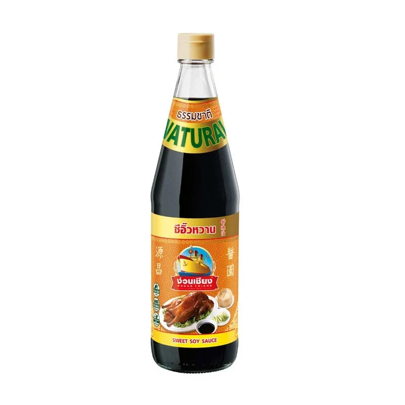 Bottle of NGUAN CHIANG Sweet Soy Sauce 970g for cooking, with dark, glossy appearance and label visible on the dry grocery product.